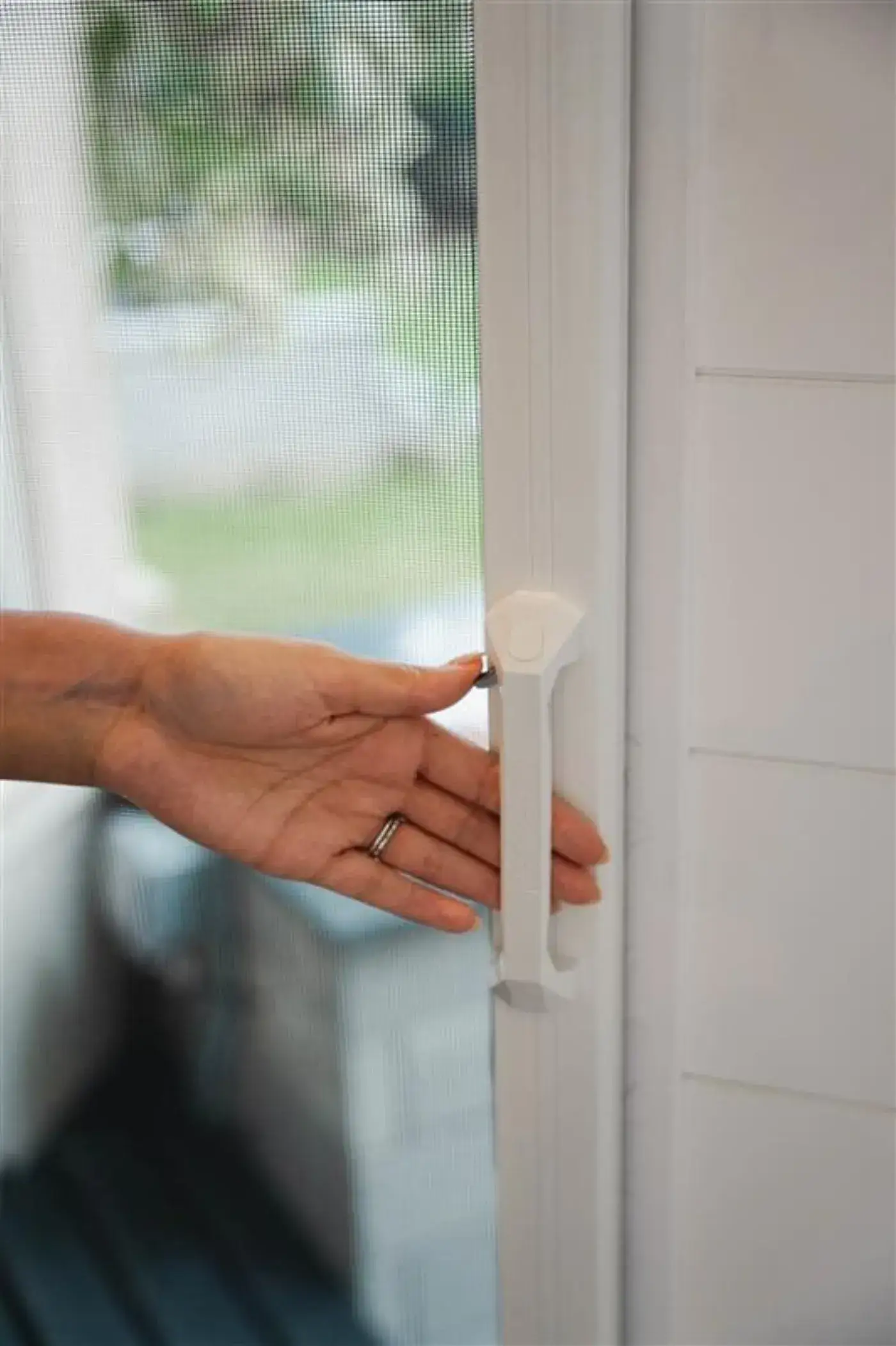 A retractable insect screen on a single hinged door